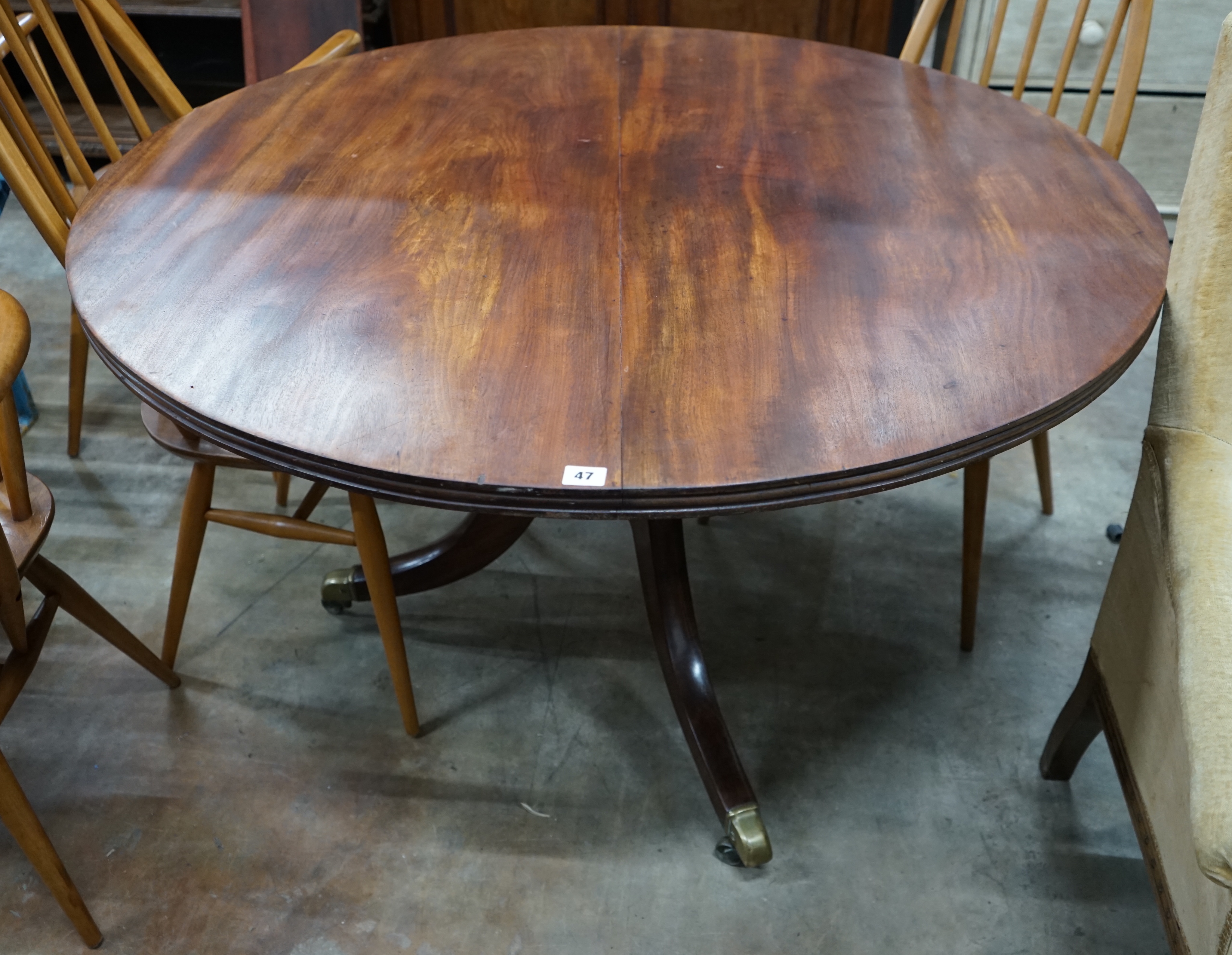 A late Regency circular mahogany tilt top breakfast table, diameter 120cm height 70cm